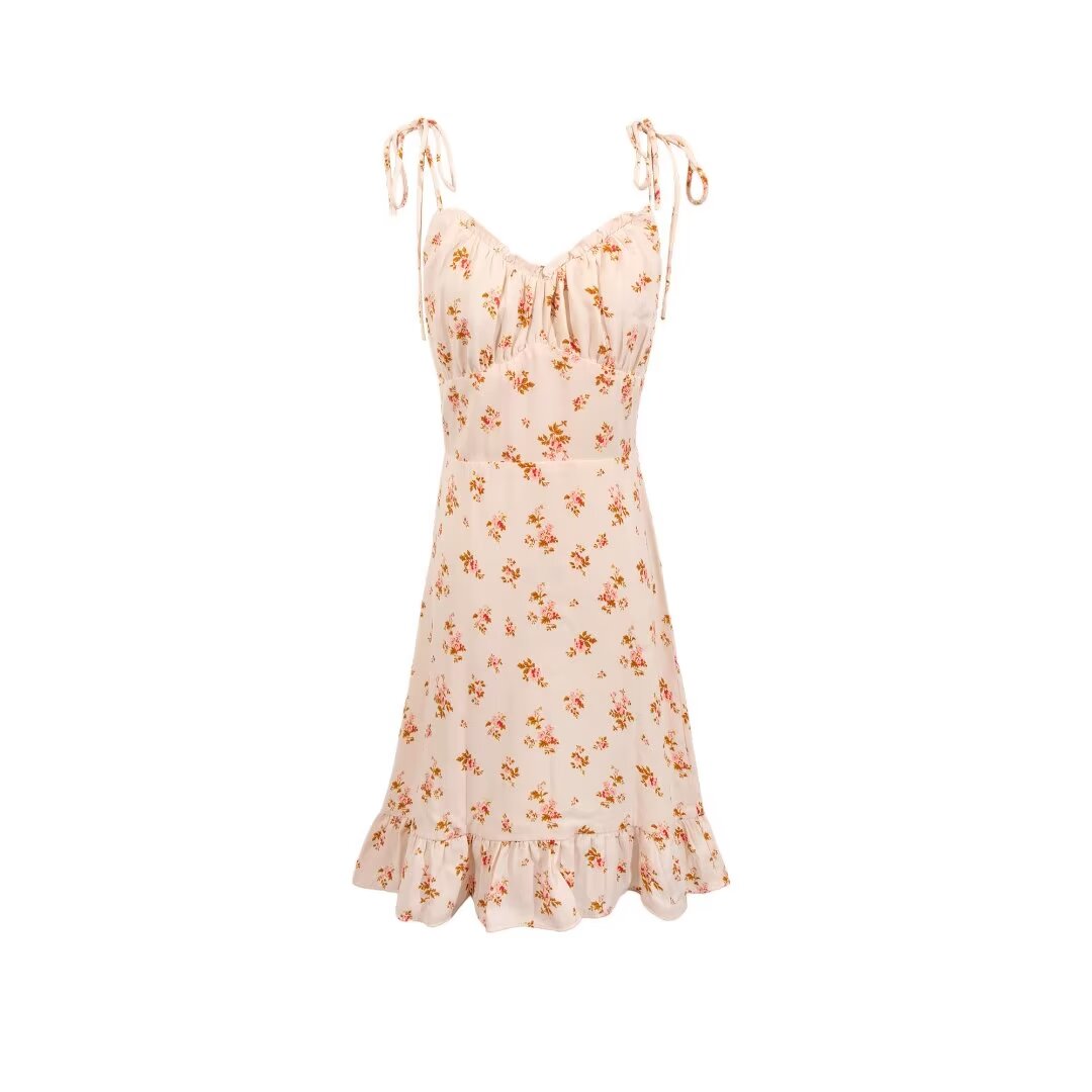 Robe à bretelles à petites fleurs beige romantique vintage pour fille au début du printemps