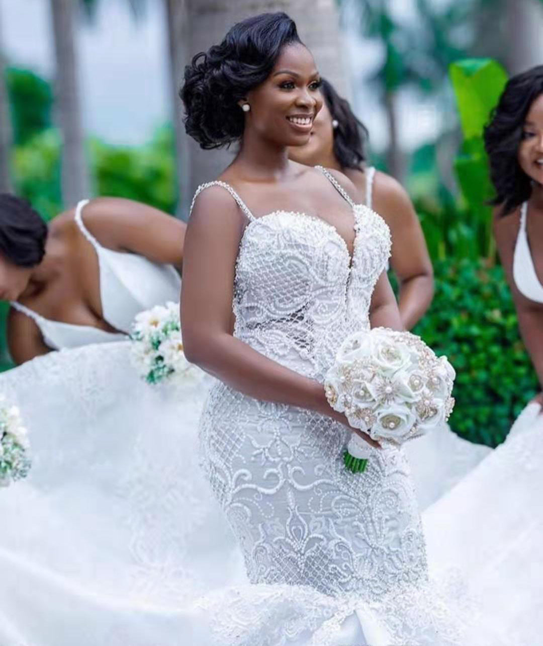 Vestido de novia de encaje con corte de sirena africana