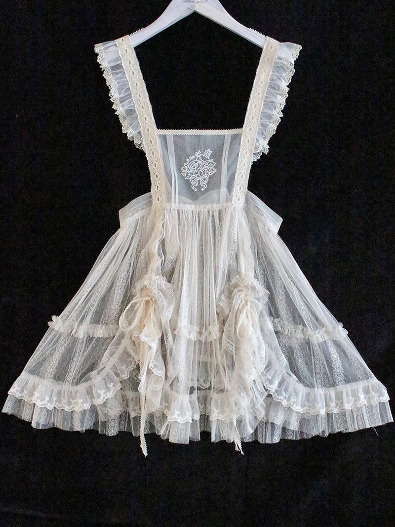 Robe tablier en voile de maille brodée de fleurs