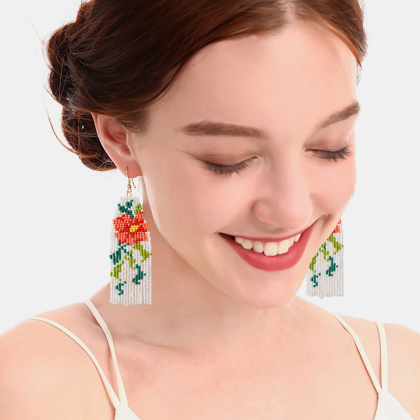 Boucles d'oreilles pendantes en perles de fleurs