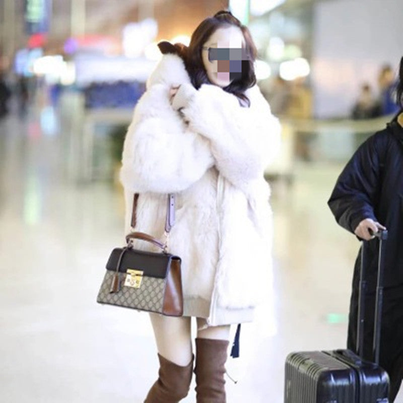 Long hooded fur coat