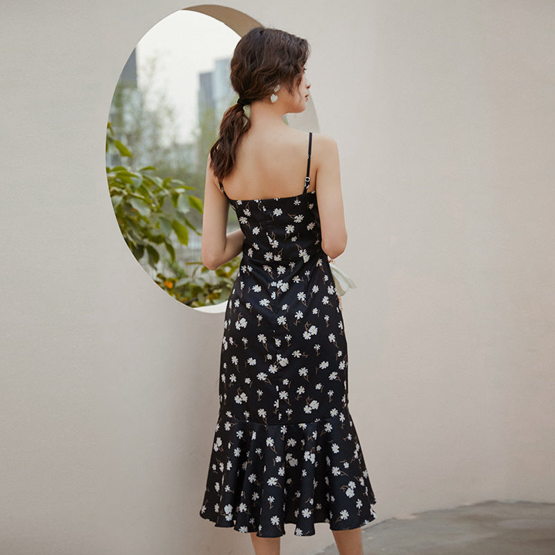 Daisy in black floral dress