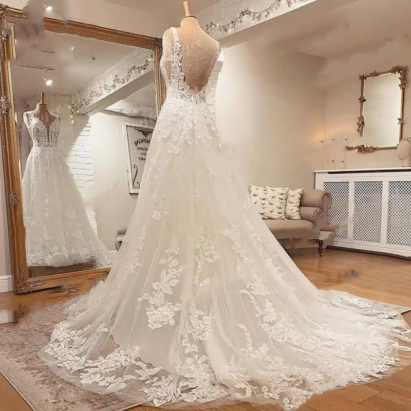 Robe de mariée en dentelle avec des appliques de mode pour femmes