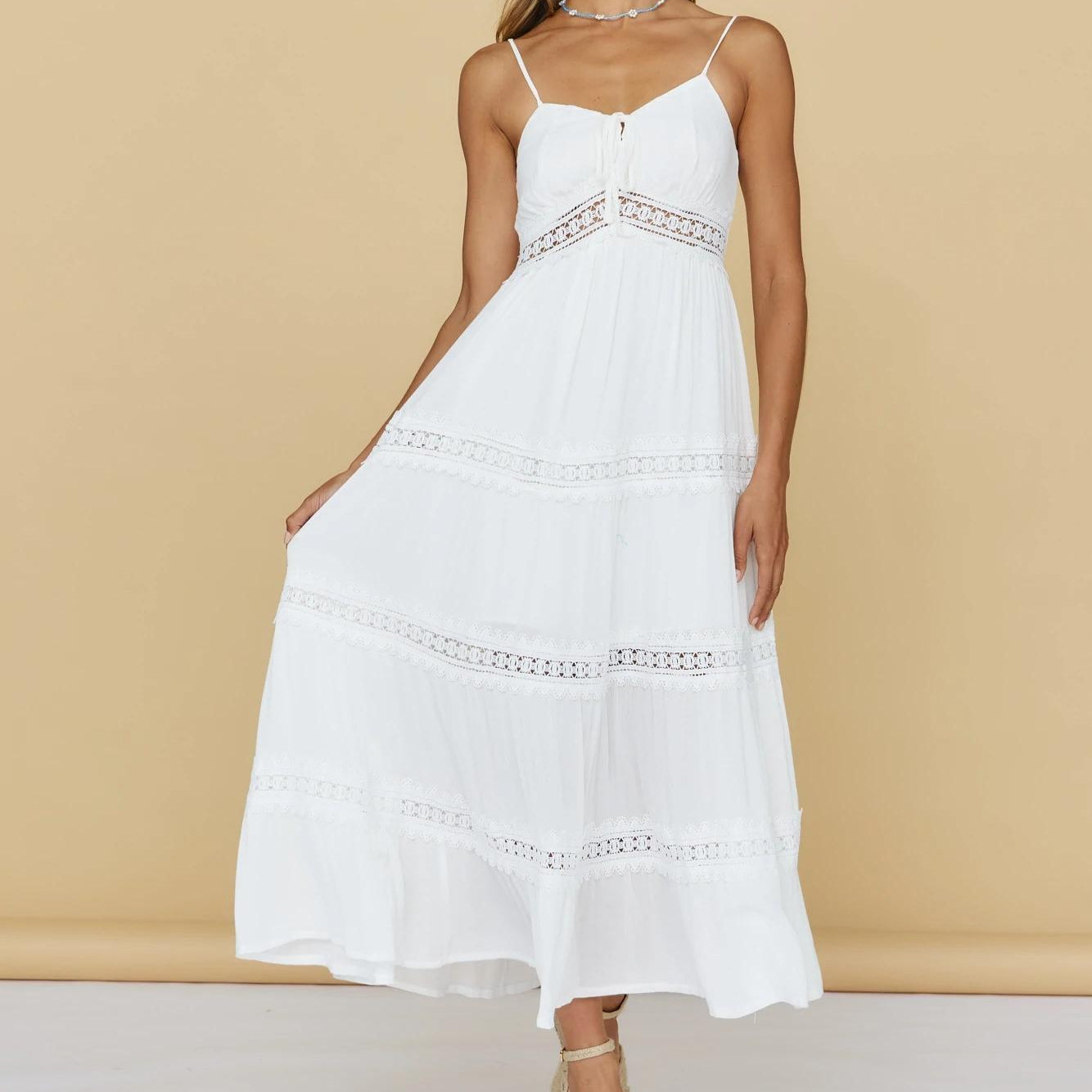 Vestido de verano de primavera nueva moda Simple cuello en V pecho con cordones blanco una línea vestido de mujer