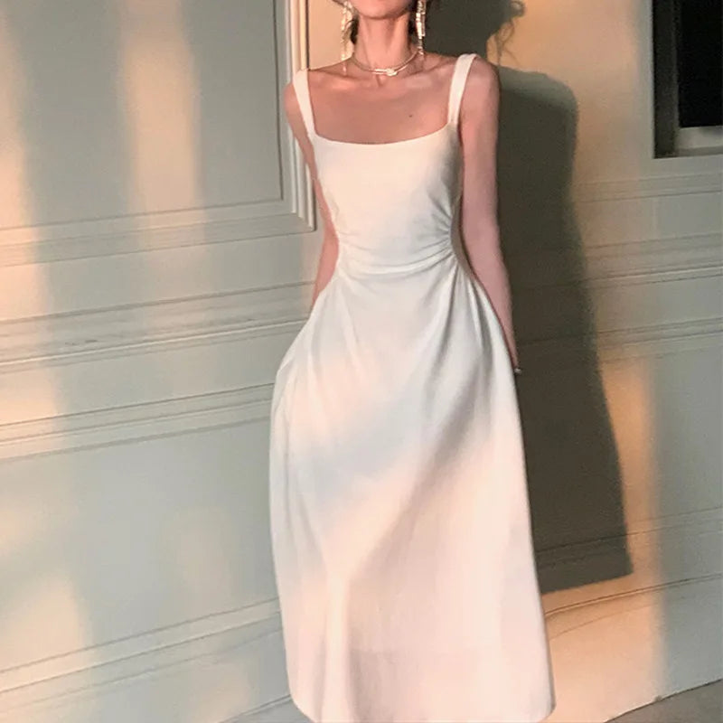 Vestido Midi blanco de fiesta nocturna para mujer, vestido de oficina ajustado Sexy sin mangas con tirantes, estilo playero, vestido coreano de una pieza para fiesta de noche 2024