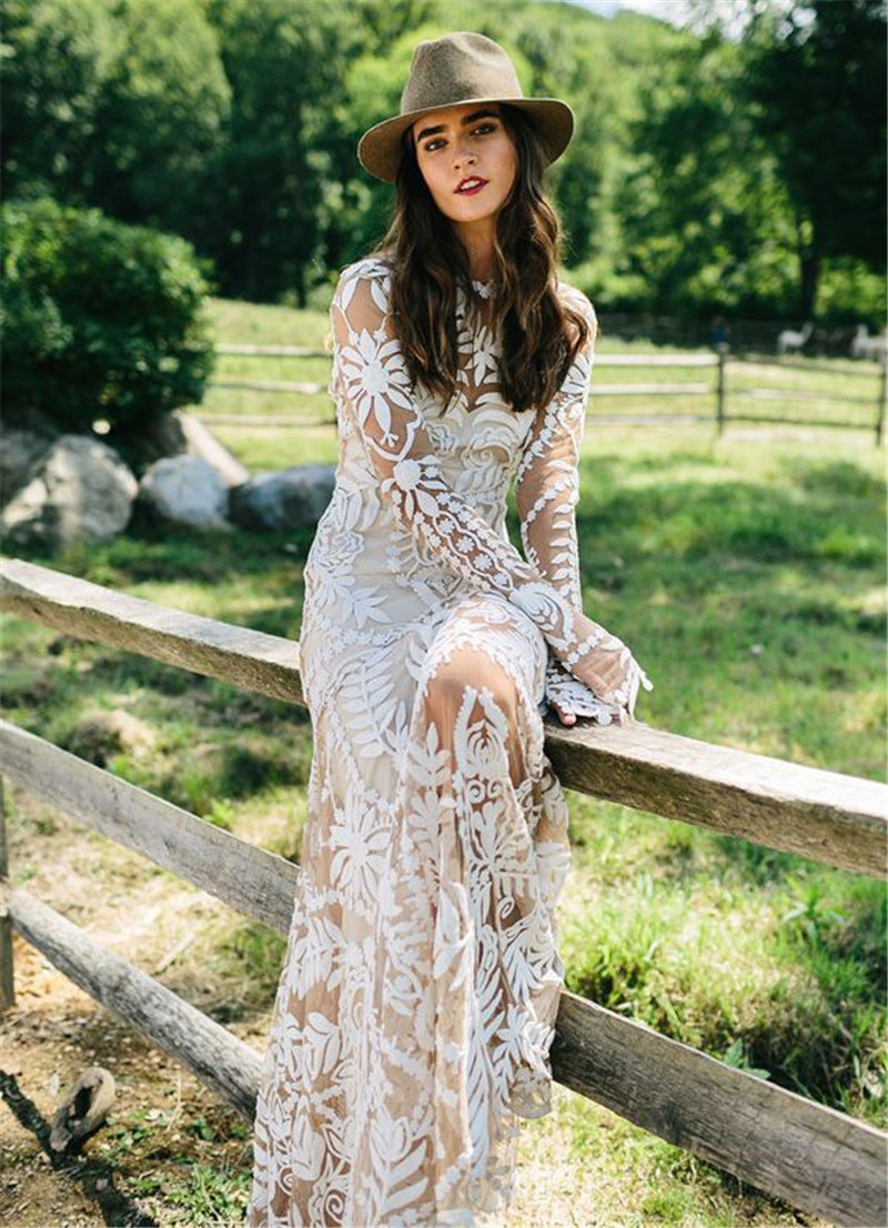 Robe de mariée queue de poisson à manches longues en dentelle